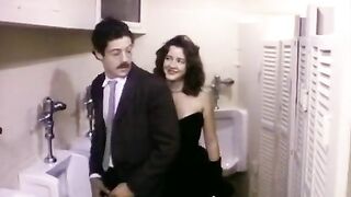 Extremely hot classic porn scene in a toilet stall