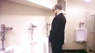 Extremely hot classic porn scene in a toilet stall