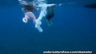 Nastya and Masha are swimming nude in the sea