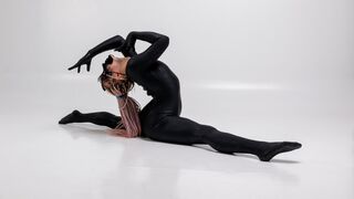 Hot gymnast with braids Lola Kauchuk dressed in latex