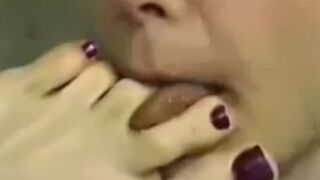 Lesbian toe sucking and licking close up