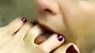 Lesbian toe sucking and licking close up