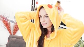 Brunette in Pikachu outfit teases a busy man