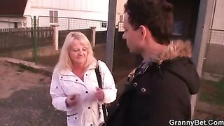 Blonde granny pleases a stranger